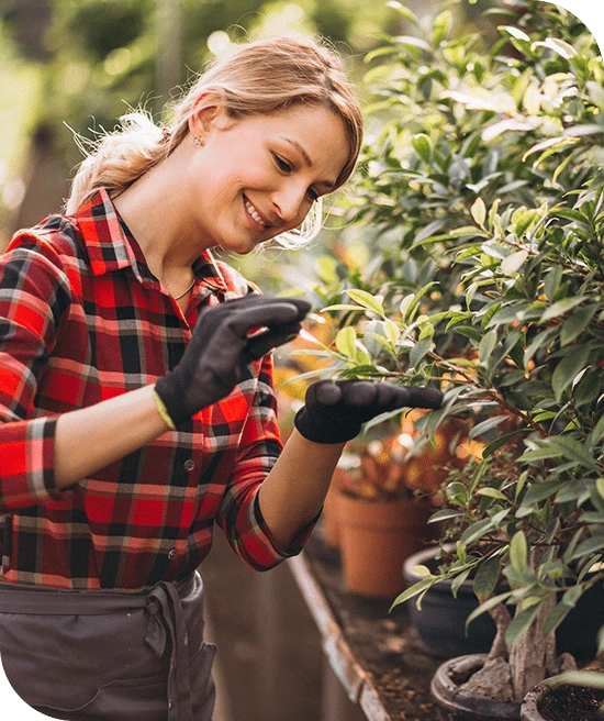 woman-taking-care-of-plants